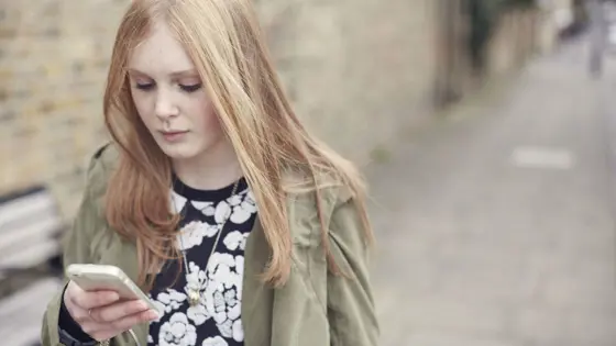 girl looking at phone.jpg