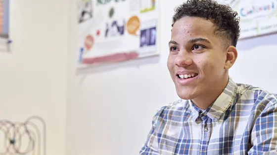 A young person looking ahead
