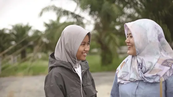 Two teenage girls talking