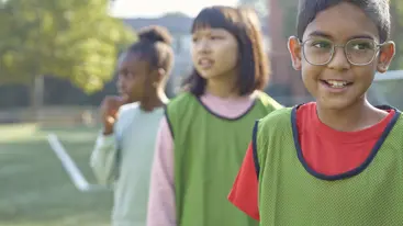 Young people outside playing sports