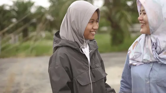 Two teenage girls talking